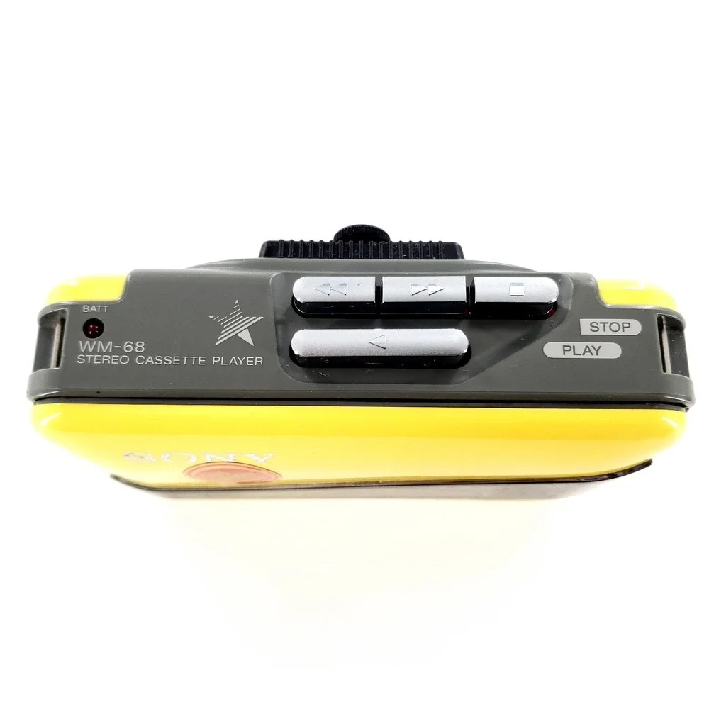 Sony Walkman WM-68 Stereo Cassette Player w/ Clip Yellow Brand New Belts Tested